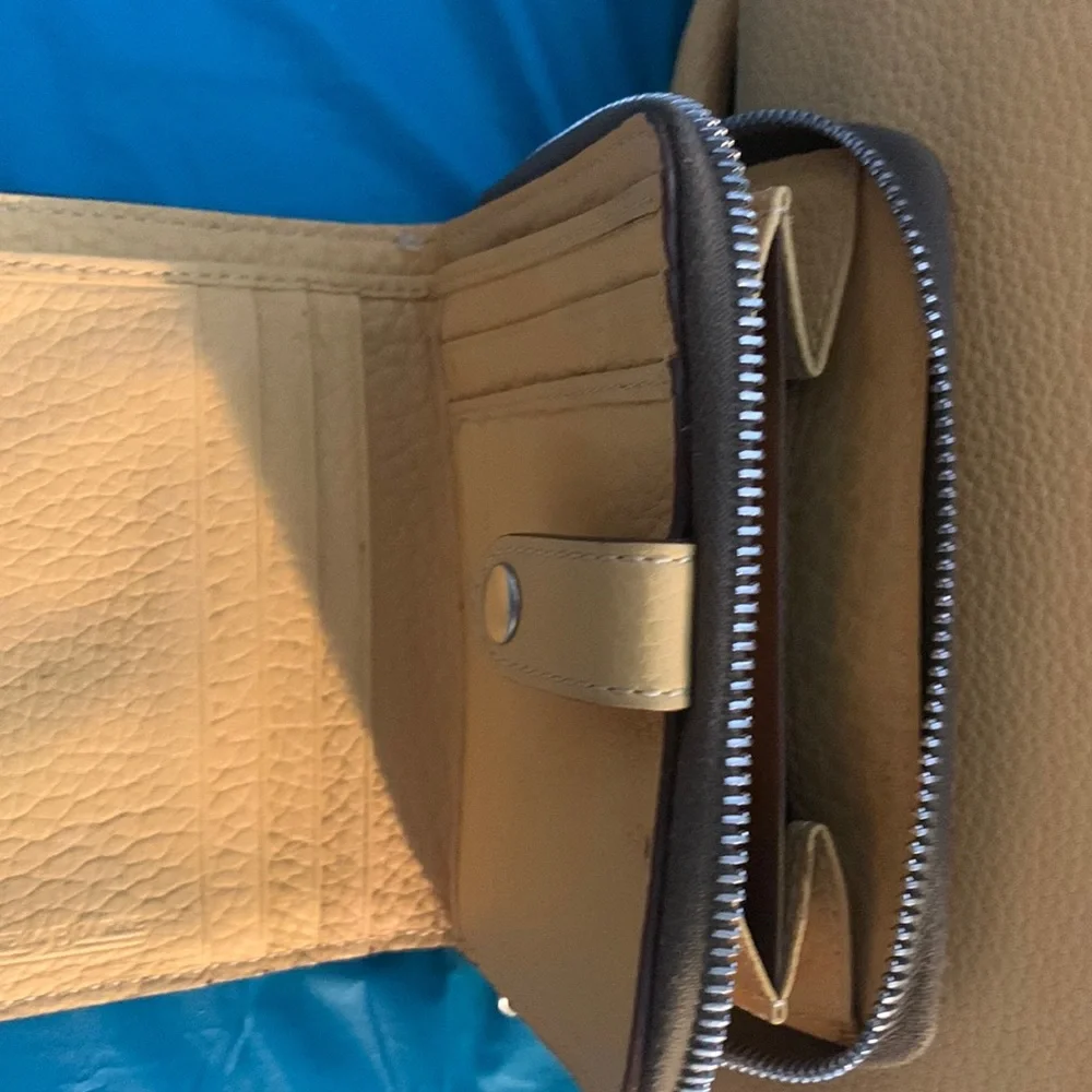 Almost New Dooney and Bourke Satchel with matching wallet. Rich Mustard Color